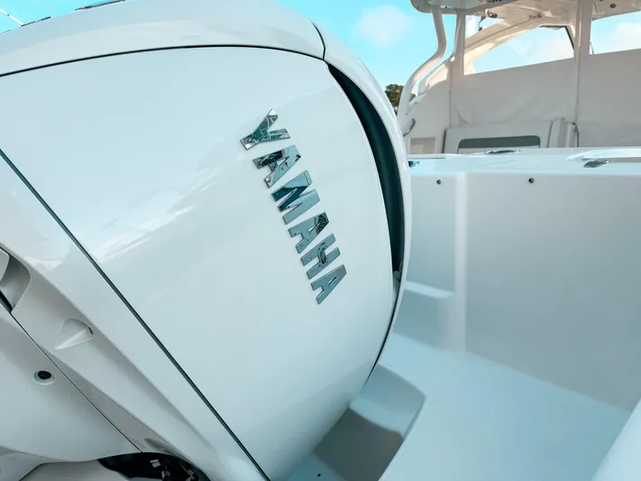  Yacht Photos Pics 2022 Pursuit DC 365 Dual Console with Yamaha engine, showcasing sleek design and modern features.