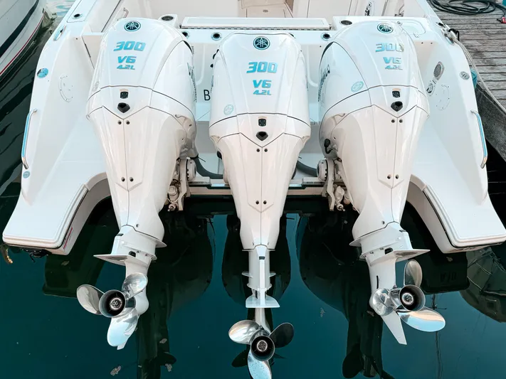  Yacht Photos Pics Triple Yamaha 300 V6 outboard engines on a 2022 Pursuit DC 365 Dual Console boat.