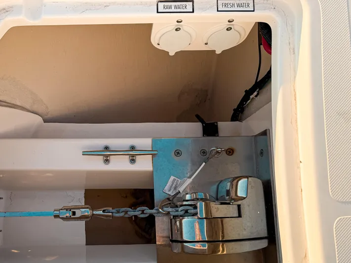  Yacht Photos Pics Anchor compartment of 2022 Pursuit DC 365 Dual Console with raw and fresh water access.