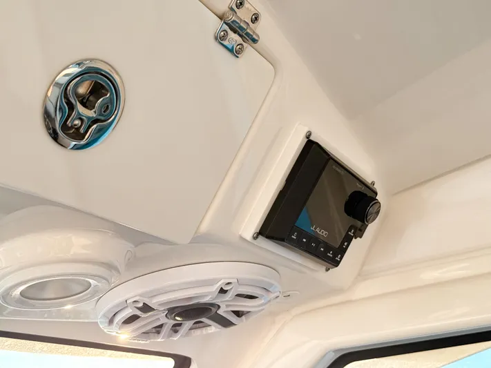  Yacht Photos Pics 2022 Pursuit DC 365 Dual Console interior with JL Audio system and speaker.