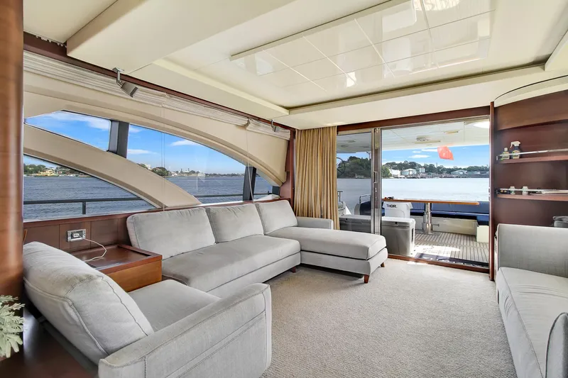  Yacht Photos Pics Luxurious interior of 2006 Azimut 75 yacht with spacious seating and scenic water views.