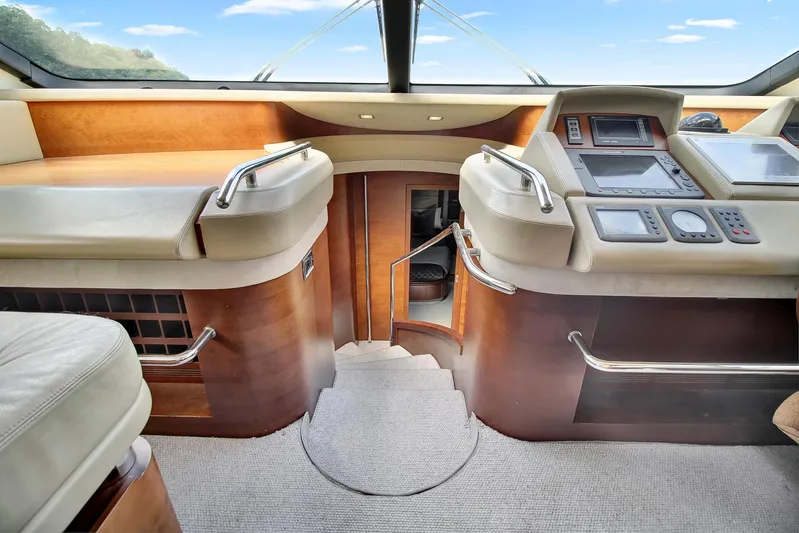  Yacht Photos Pics Interior of a 2006 Azimut 75 yacht cockpit with modern controls and luxurious design.