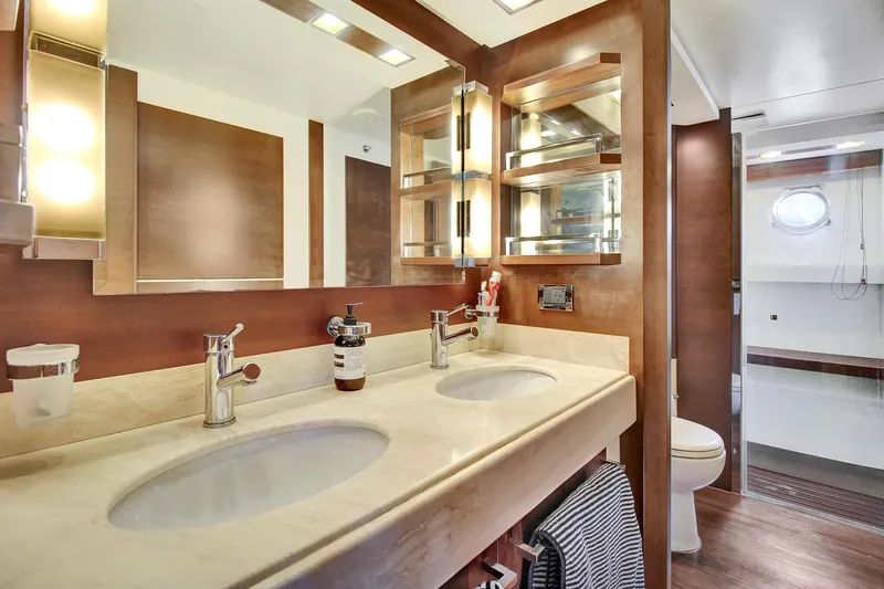  Yacht Photos Pics Luxurious bathroom interior of 2006 Azimut 75 yacht with double sinks and modern fixtures.