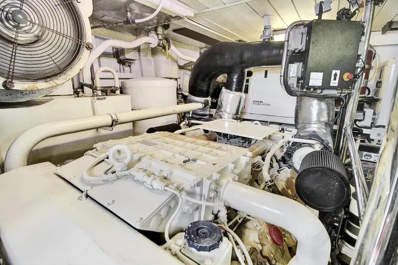  Yacht Photos Pics Engine room of a 2006 Azimut 75 yacht, showcasing mechanical components and systems.