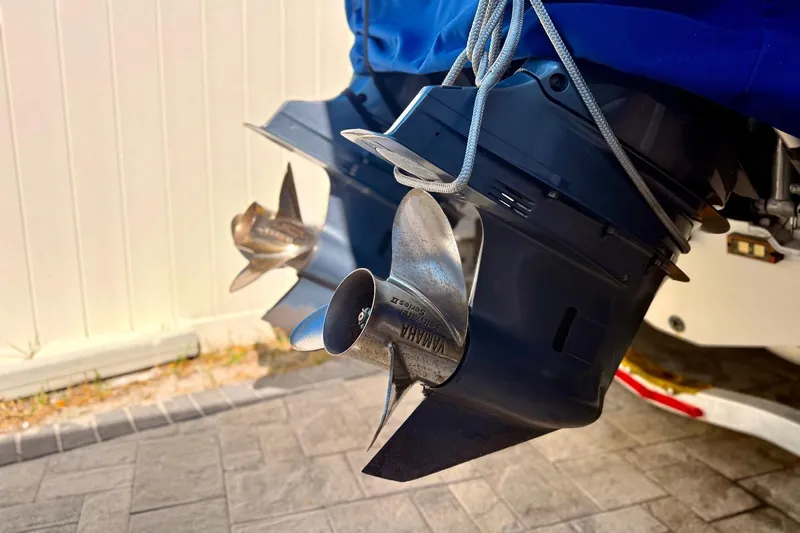  Yacht Photos Pics Twin Yamaha outboard motors on a 2016 Sailfish 290 CC boat, close-up view.