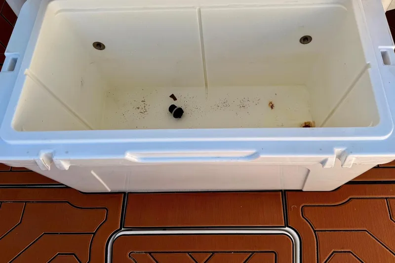  Yacht Photos Pics Empty white cooler on Sailfish 290 CC boat deck, 2016 model.