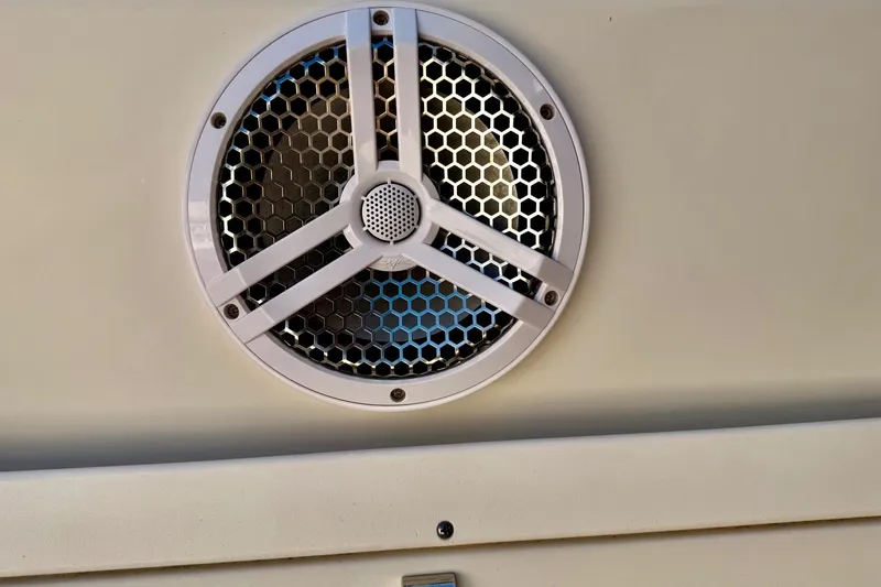  Yacht Photos Pics Speaker grille on a 2016 Sailfish 290 CC boat, featuring a hexagonal pattern.