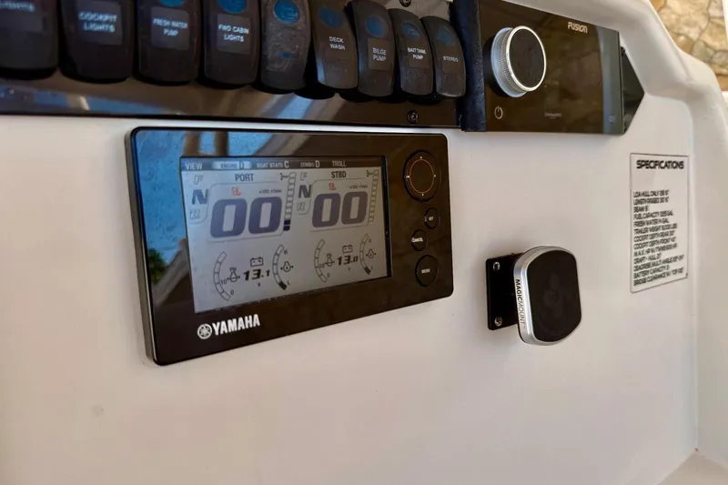  Yacht Photos Pics Control panel of 2016 Sailfish 290 CC boat with Yamaha display and switches.