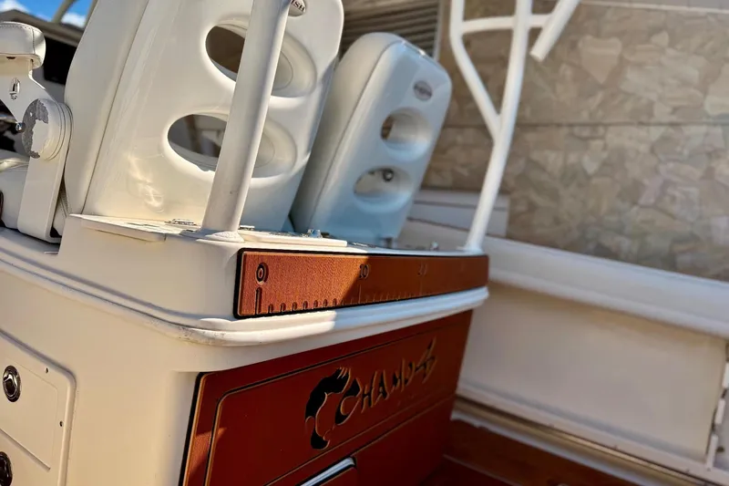  Yacht Photos Pics 2016 Sailfish 290 CC boat interior with white seating and measuring board.