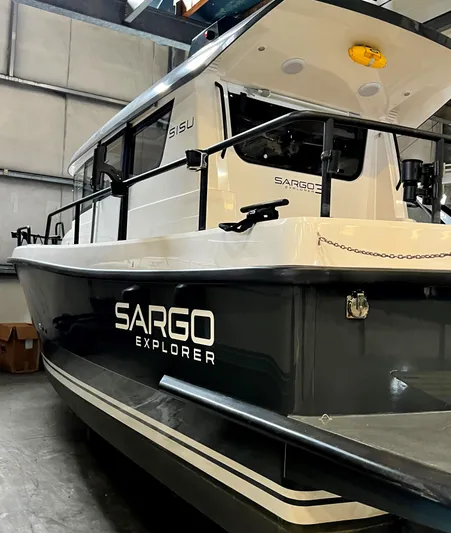 Sisu Yacht Photos Pics 2020 Sargo 31 Explorer boat in a warehouse.