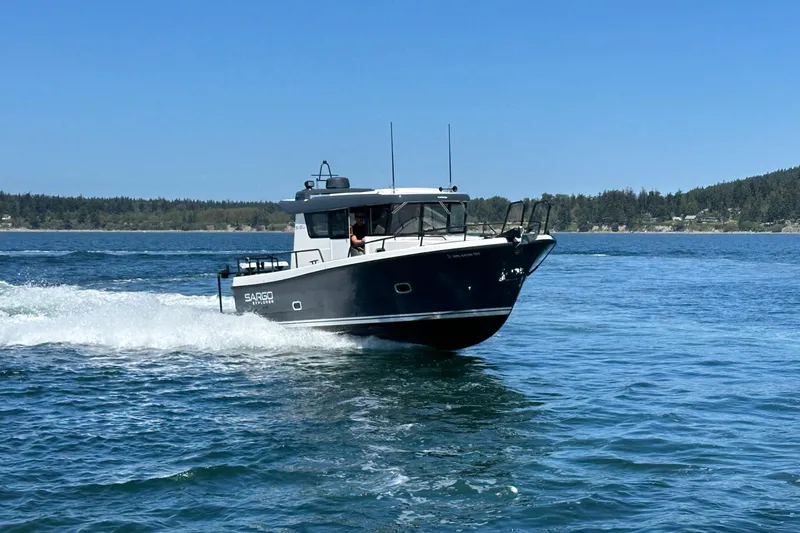 Sisu Yacht Photos Pics 2020 Sargo 31 boat cruising on a sunny day.