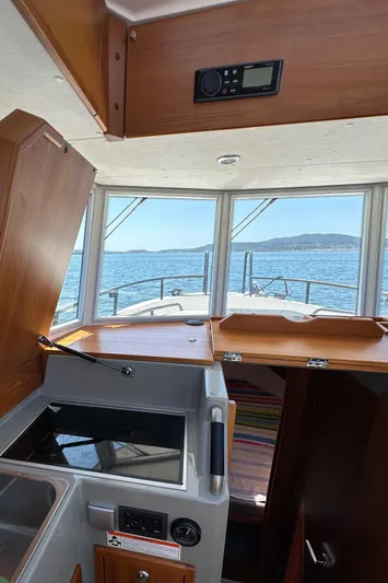 Sisu Yacht Photos Pics Interior view of 2020 Sargo 31 boat with ocean in background.