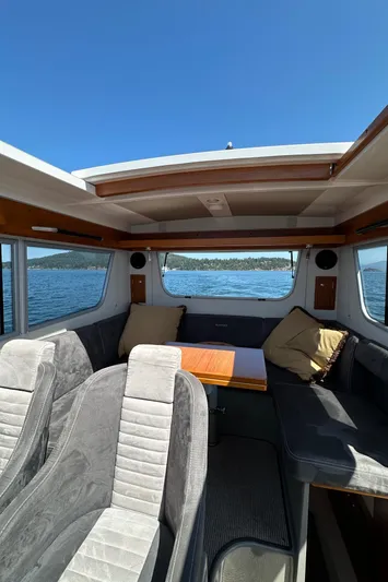 Sisu Yacht Photos Pics Interior of 2020 Sargo 31 boat with seating and scenic water view.