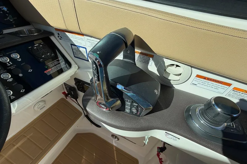 Sea Jay Yacht Photos Pics 2023 Sea Ray Sundancer 320 Outboard helm controls with throttle and joystick.