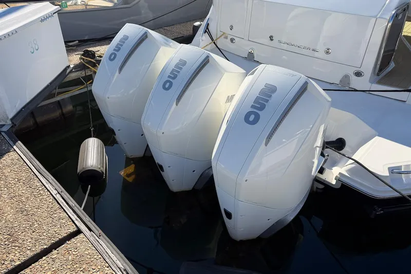 Sea Jay Yacht Photos Pics 2023 Sea Ray Sundancer 320 Outboard with triple engines docked at marina.