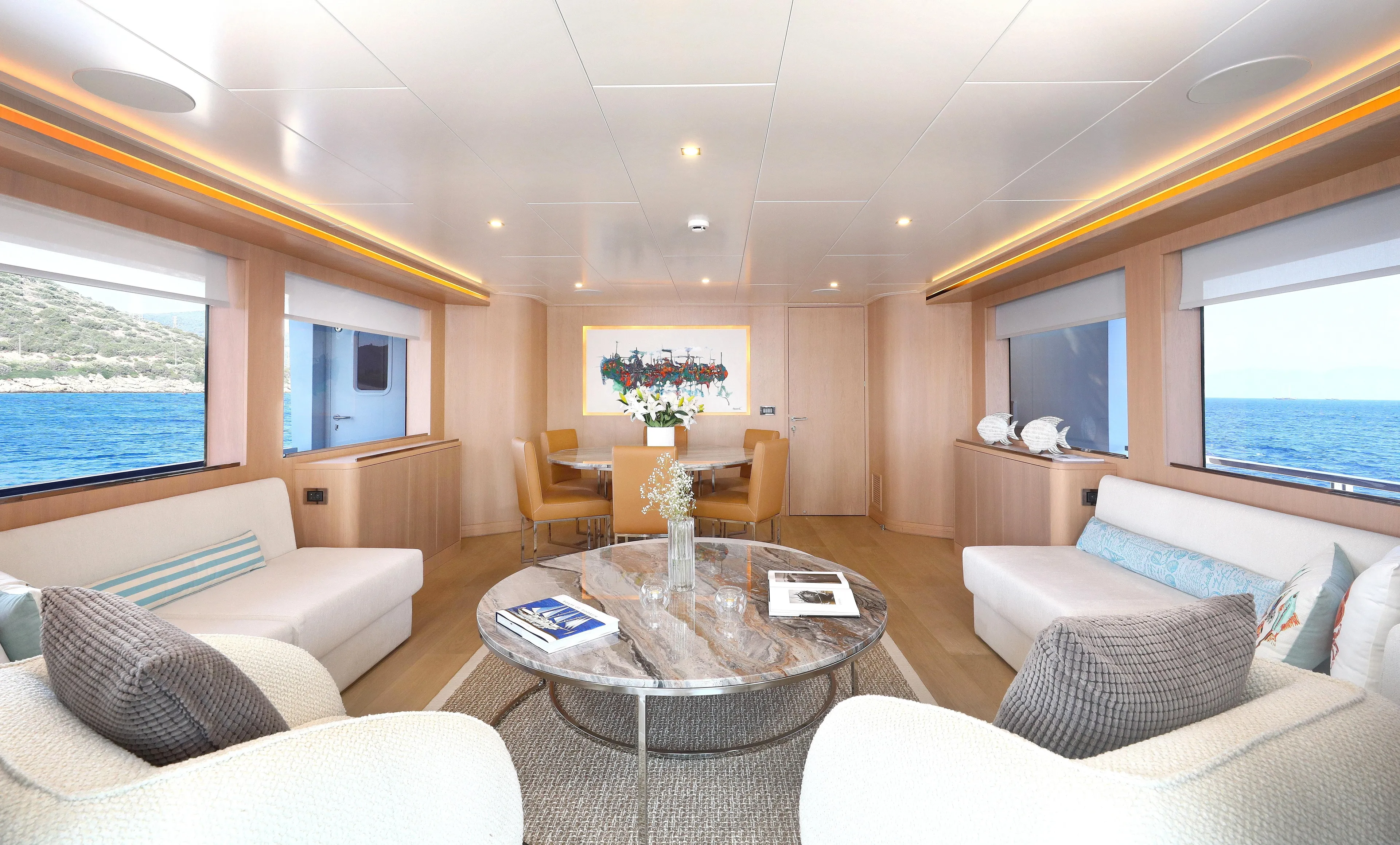 Tortura Yacht Photos Pics Luxurious interior of 2024 Aegean Yacht Explorer M26 with elegant seating and ocean views.