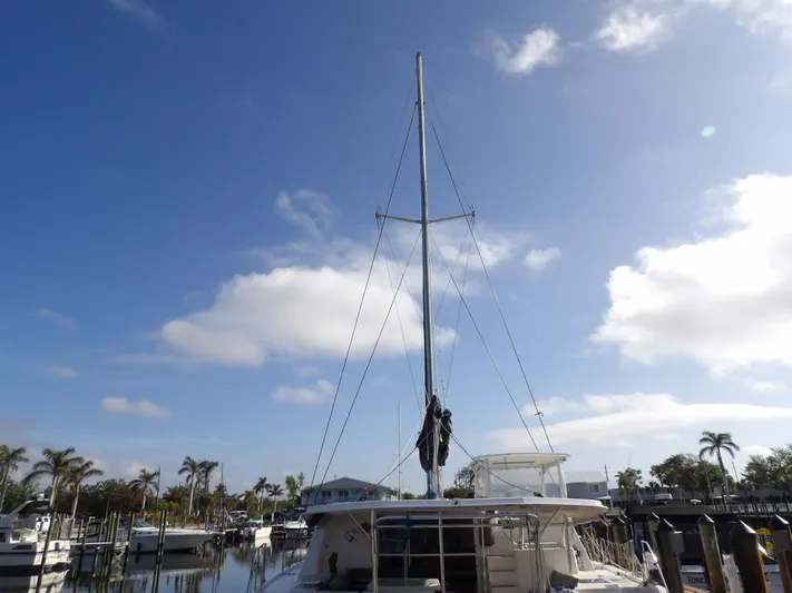  Yacht Photos Pics 2014 Leopard 48 yacht docked under a clear blue sky.
