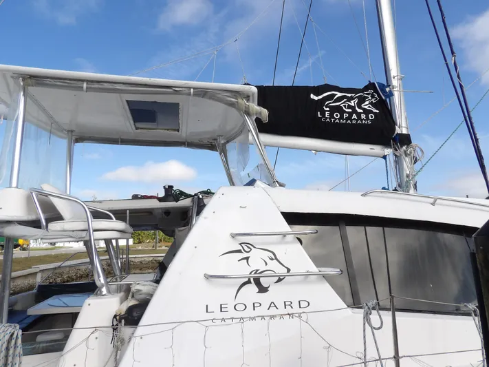  Yacht Photos Pics Leopard 48 catamaran, 2014 model, featuring sleek design and branding.