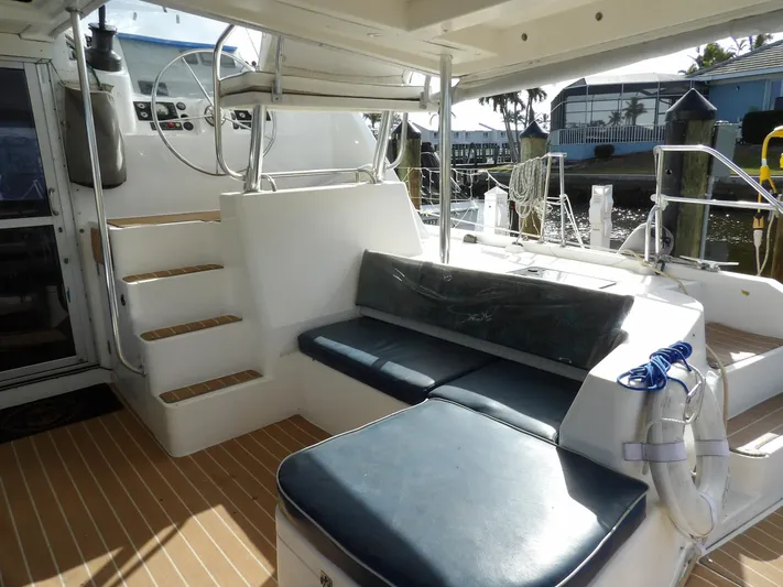  Yacht Photos Pics Leopard 48 yacht interior, 2014 model, featuring seating and helm station.