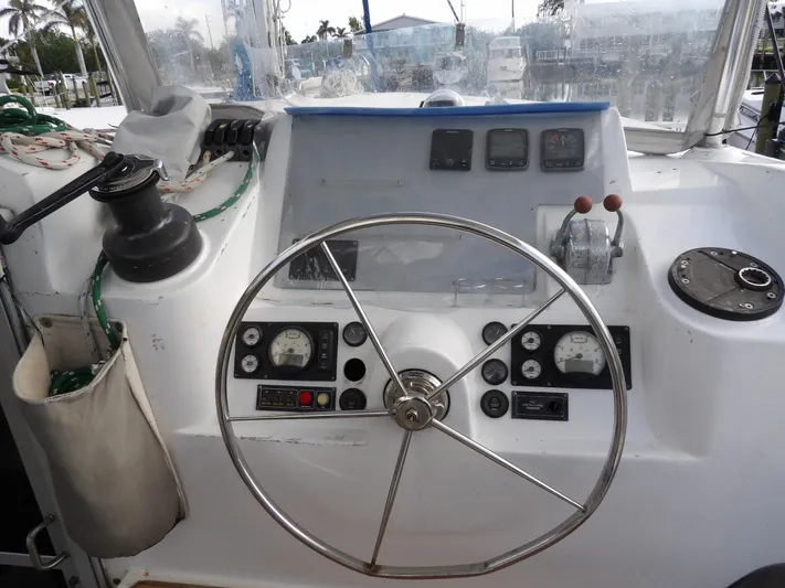  Yacht Photos Pics Steering wheel and control panel of a 2014 Leopard 48 yacht.