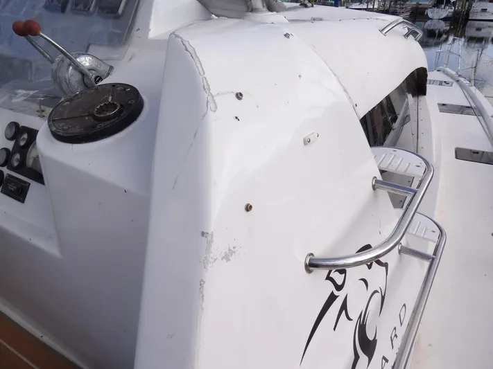  Yacht Photos Pics Leopard 48 yacht, 2014 model, showing helm and deck details.