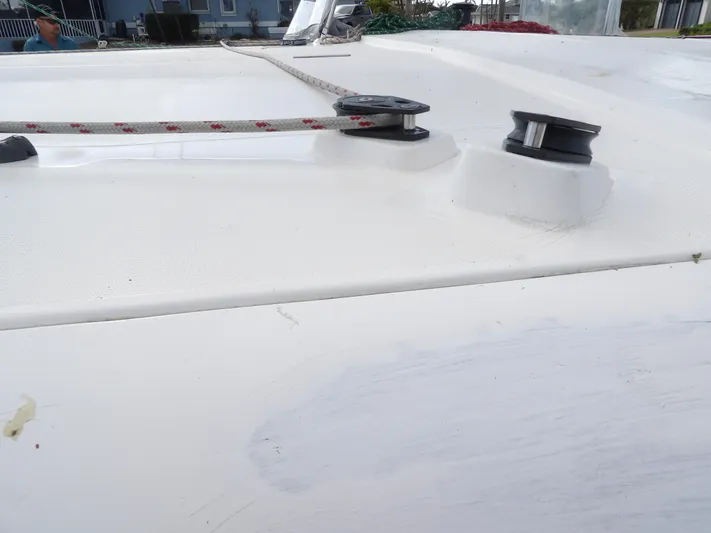  Yacht Photos Pics Close-up of 2014 Leopard 48 yacht deck with rigging details.