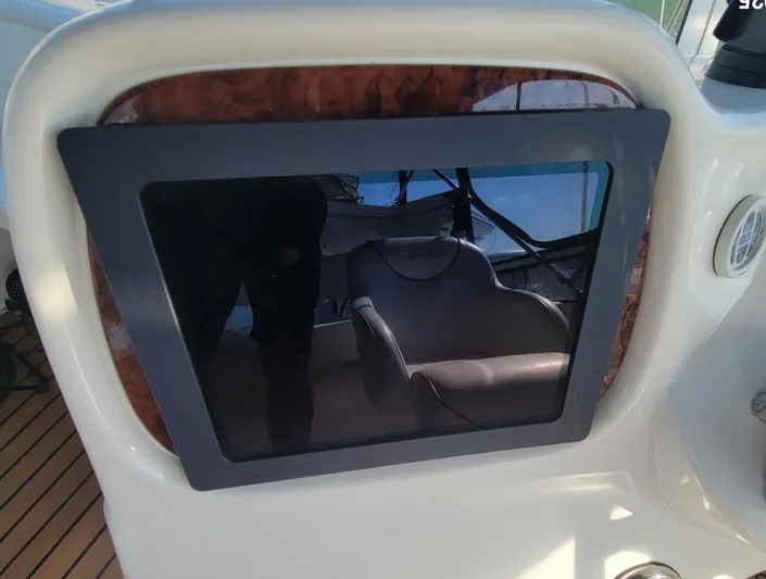 'next Week' Yacht Photos Pics Control panel of a 2000 Sea Ray 380 Aft Cabin yacht, featuring a sleek design.