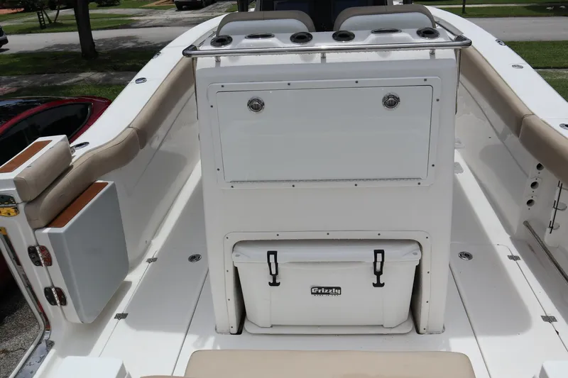  Yacht Photos Pics 2016 Sea Fox Commander 288 boat interior with seating and storage compartments.