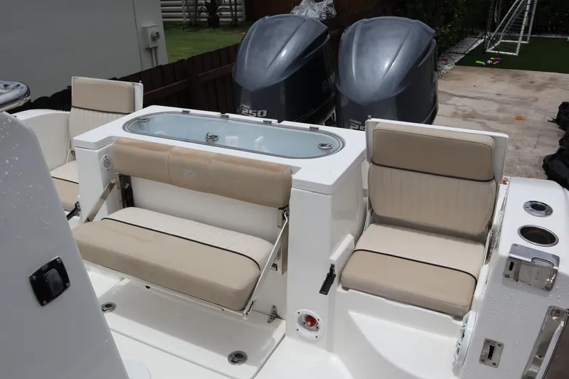  Yacht Photos Pics 2016 Sea Fox Commander 288 boat interior with seating and dual Yamaha engines.