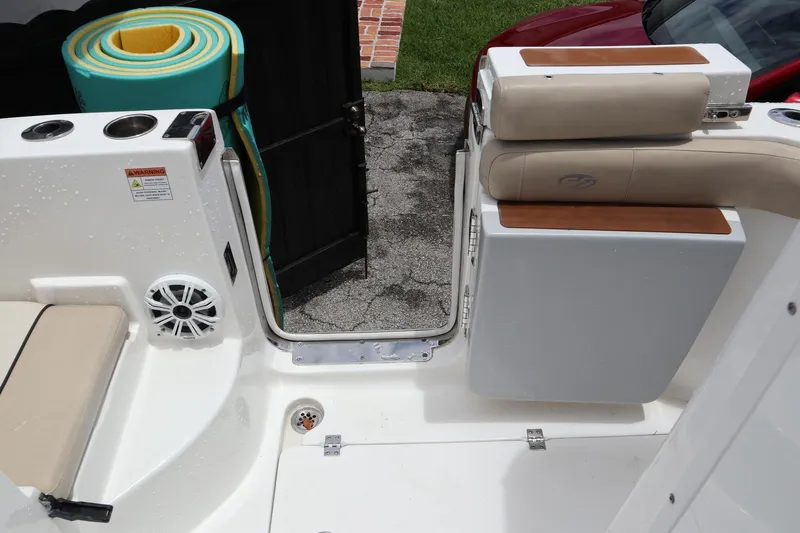  Yacht Photos Pics 2016 Sea Fox Commander 288 boat interior with seating and storage area.