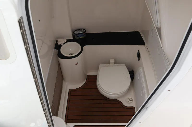  Yacht Photos Pics 2016 Sea Fox Commander 288 boat bathroom with toilet and sink.