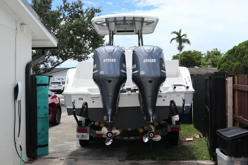  Yacht Photos Pics 2016 Sea Fox Commander 288 boat with dual Yamaha 250 engines parked outdoors.