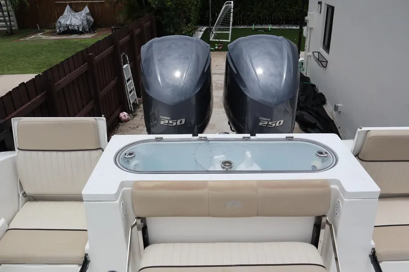  Yacht Photos Pics 2016 Sea Fox Commander 288 boat with twin Yamaha 250 engines and seating area.