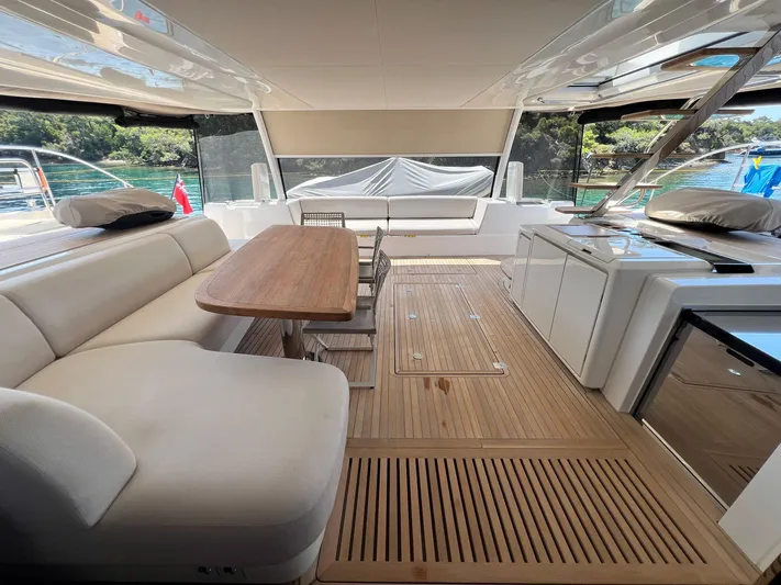 Ns03445 Yacht Photos Pics Luxurious 2022 Lagoon SIXTY 7 yacht interior with elegant seating and dining area.