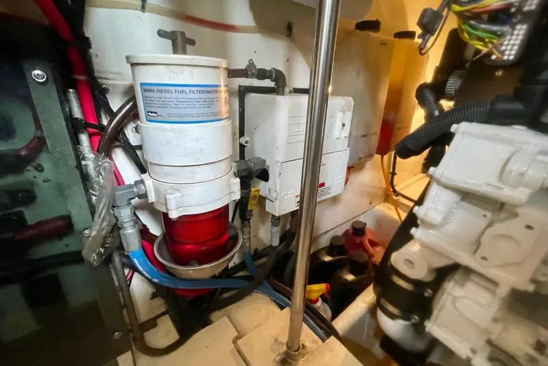 Musn't Touch It Yacht Photos Pics Engine room of 1996 Egg Harbor Golden Egg 38 with diesel fuel filter system.