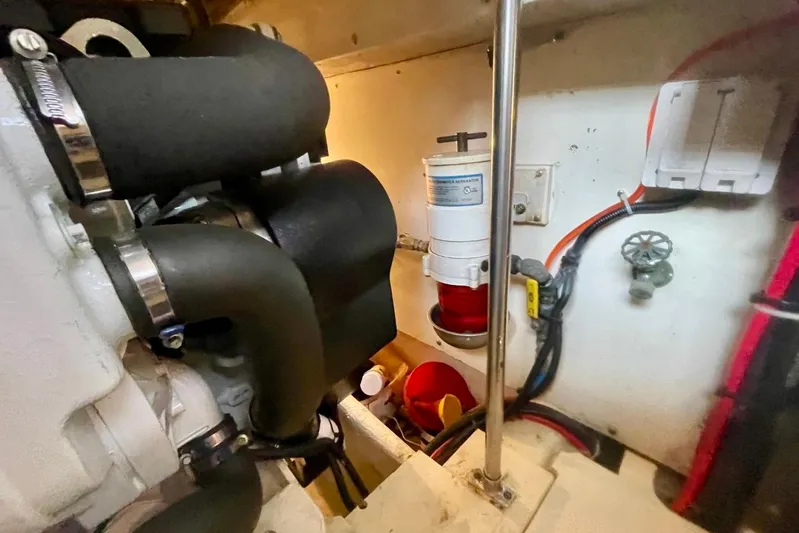 Musn't Touch It Yacht Photos Pics Engine room of 1996 Egg Harbor Golden Egg 38 with visible components and wiring.