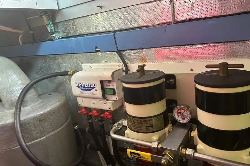  Yacht Photos Pics Engine room of 2006 Mariner Orient with Reverso oil change system and fuel filters.