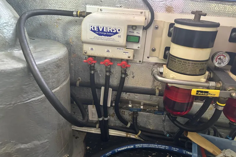  Yacht Photos Pics Engine room of 2006 Mariner Orient with Reverso oil change system and Racor fuel filter.