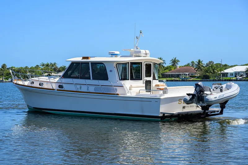 Seabird Yacht Photos Pics 2014 Grand Banks 46 Eastbay SX yacht cruising on a sunny day.