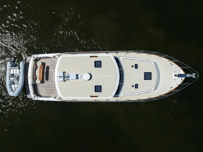 Seabird Yacht Photos Pics Aerial view of 2014 Grand Banks 46 Eastbay SX yacht on water.