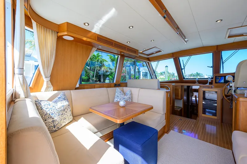Seabird Yacht Photos Pics Luxurious 2014 Grand Banks 46 Eastbay SX yacht interior with elegant seating and wooden finishes.