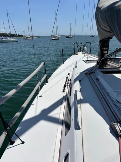 Ceilidh Yacht Photos Pics 2018 J Boats J/121 sailboat on calm water, with visible deck and rigging.