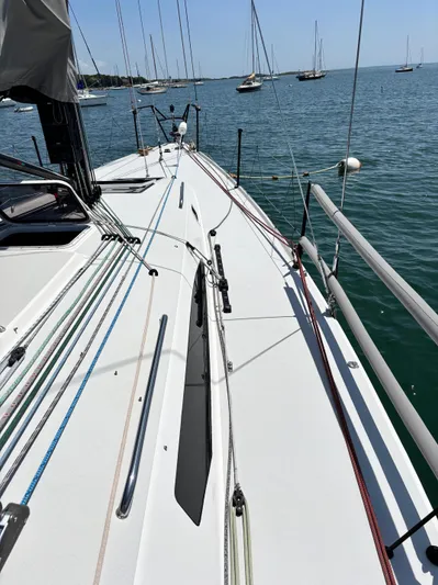 Ceilidh Yacht Photos Pics 2018 J Boats J/121 sailboat deck with rigging, moored in a calm harbor.