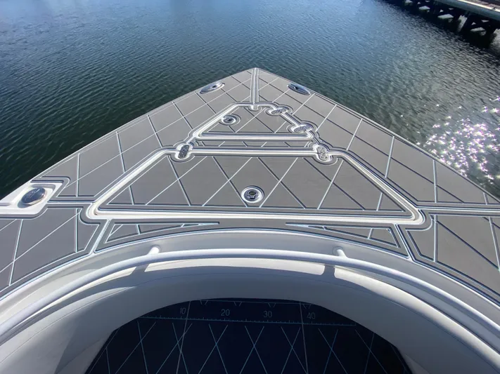  Yacht Photos Pics 2022 Fountain 34 Tournament Edition boat bow on water.