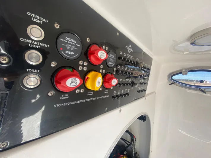  Yacht Photos Pics Control panel of a 2022 Fountain 34 Tournament Edition boat.