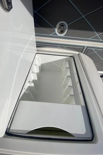  Yacht Photos Pics 2022 Fountain 34 Tournament Edition boat storage compartment.