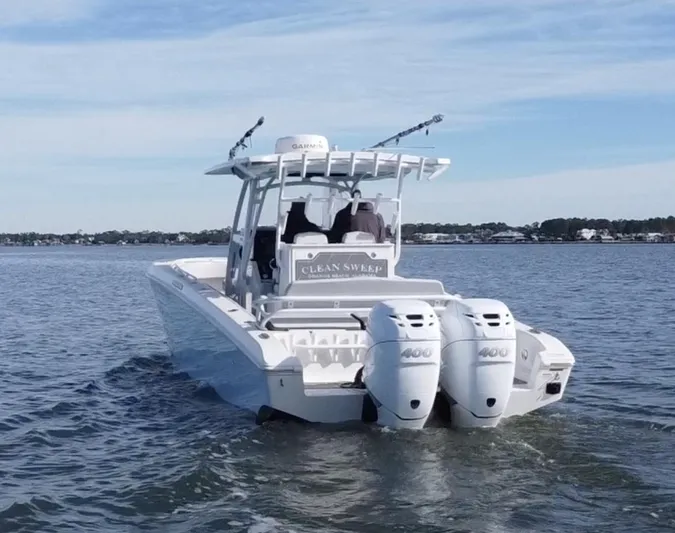  Yacht Photos Pics 2022 Fountain 34 Tournament Edition boat on water with twin engines.