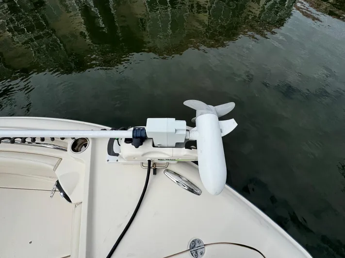 Tranquility Yacht Photos Pics Grady-White Freedom 285 boat with trolling motor, 2021 model, on calm water.