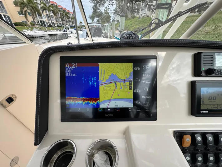 Tranquility Yacht Photos Pics Grady-White Freedom 285 boat dashboard with navigation display, 2021 model.