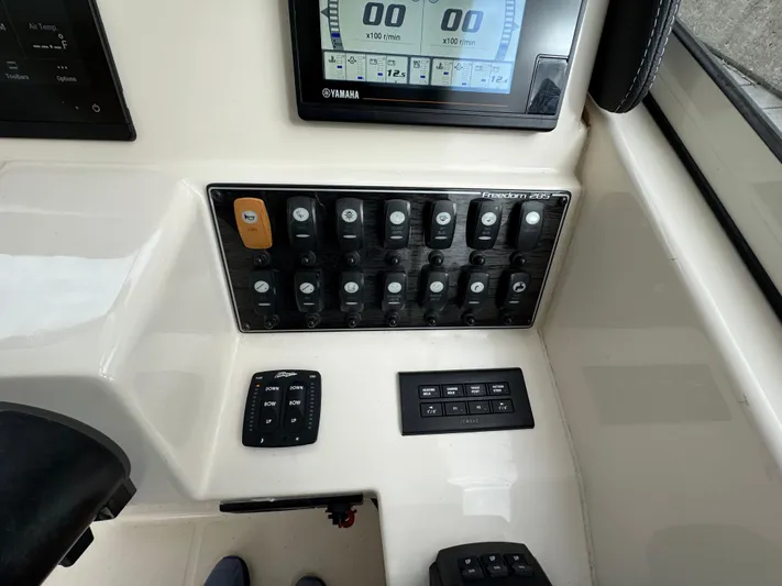 Tranquility Yacht Photos Pics Control panel of 2021 Grady-White Freedom 285 boat with Yamaha display.